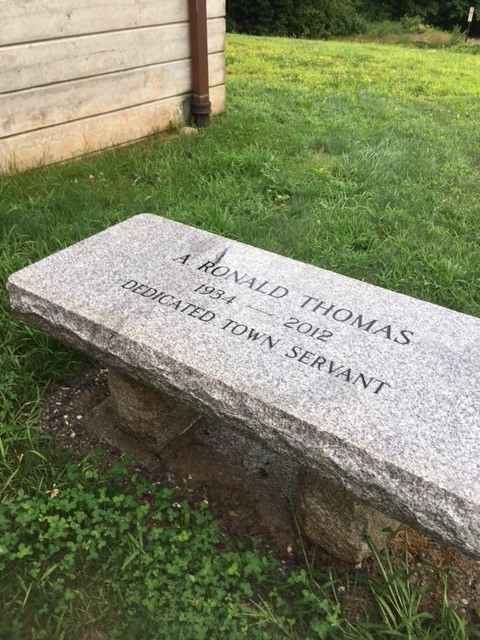The memorial bench at the Smyth Memorial Library, in honor of Ron Thomas, a selfless volunteer.